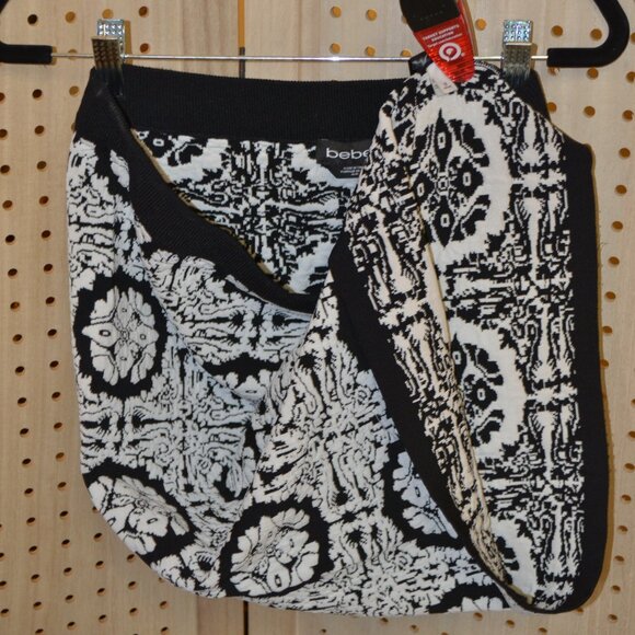 " BEBE " BLACK AND WHITE FLEXIBLE SKIRT SIZE M - Picture 7 of 7